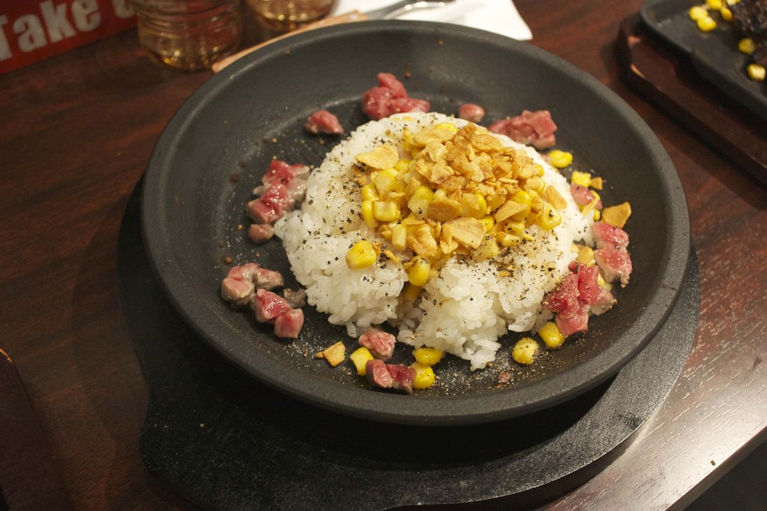 Pepper Rice with chunks of beef and fried garlic chips<br>